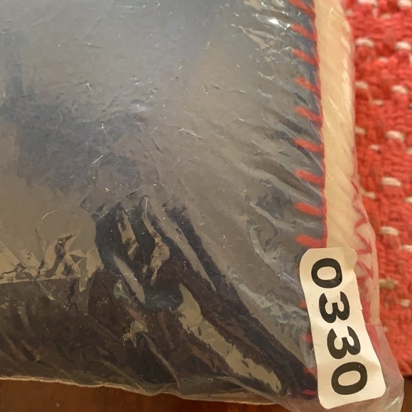 The flag scarf is cozy and soft to the touch. - Picture 5 of 13